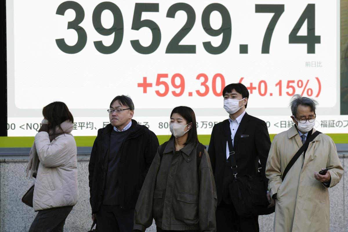 Asian group walking by stock numbers