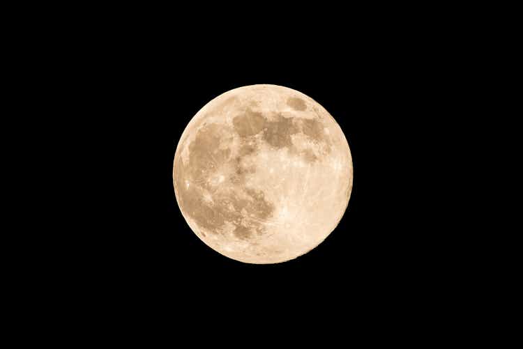 Nice full moon with soft yellow color an visible craters